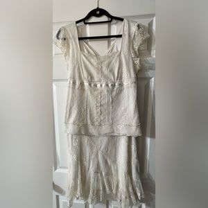 Short sleeved White intricate lace skirt set. Size L (fits like a M-L)